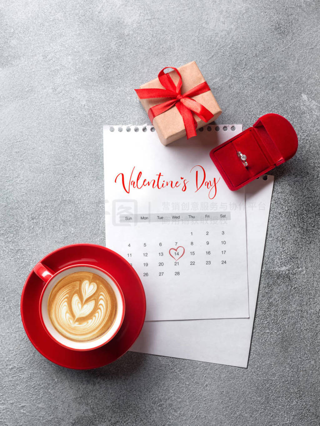 s Day greeting card. Red coffee cup, ring and gift box over febr