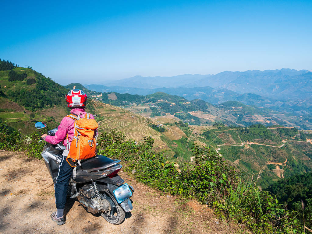 One person riding bike on Ha Giang motorbike loop, famous travel