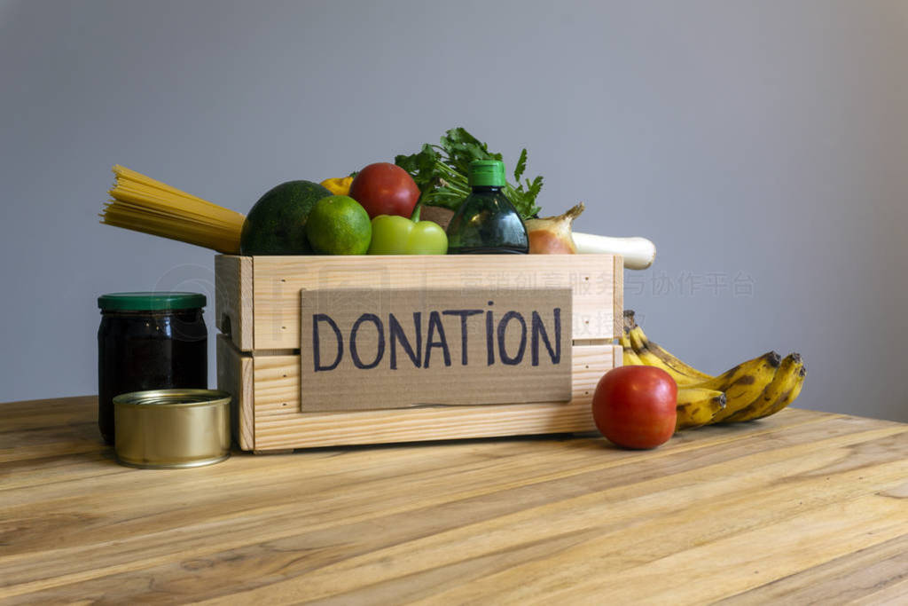 Food donation concept. Donation box with vegetables, fruits and
