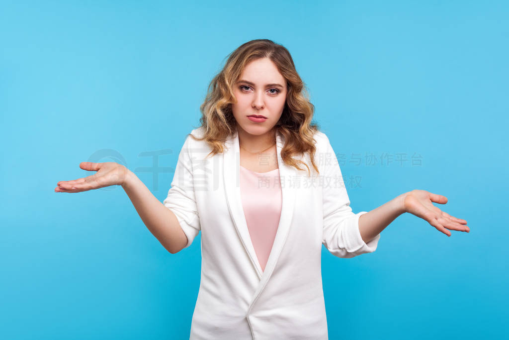 Don't know! Portrait of confused clueless woman raised hands in