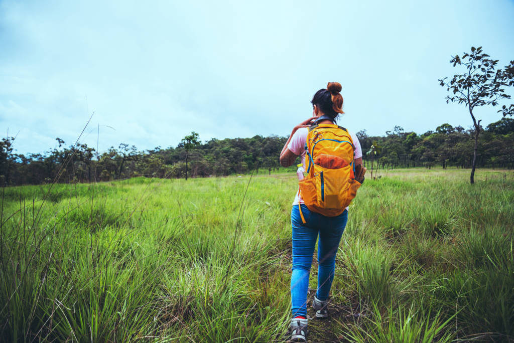 woman Asian travel nature. Travel relax. Walk study the path