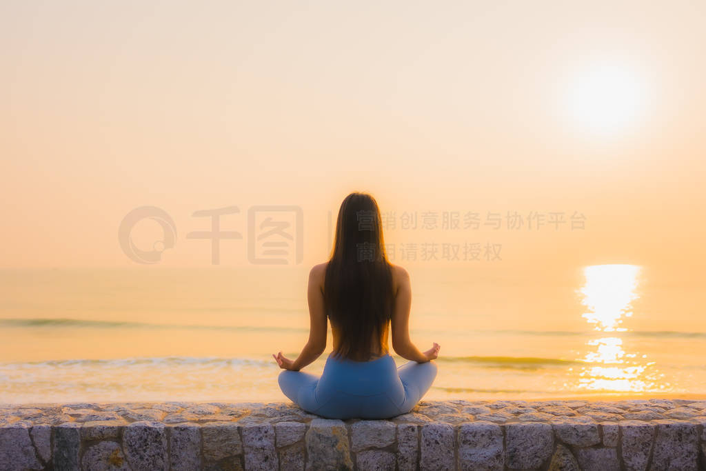Portrait young asian woman do meditation around sea beach ocean
