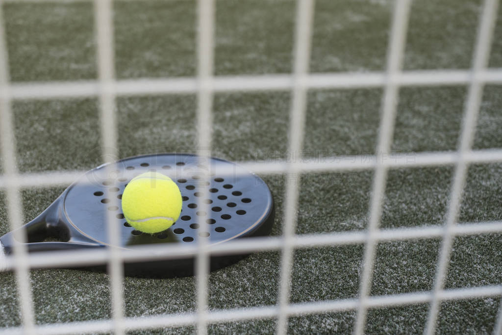 paddle tennis objects in court, , racket, balls and fences