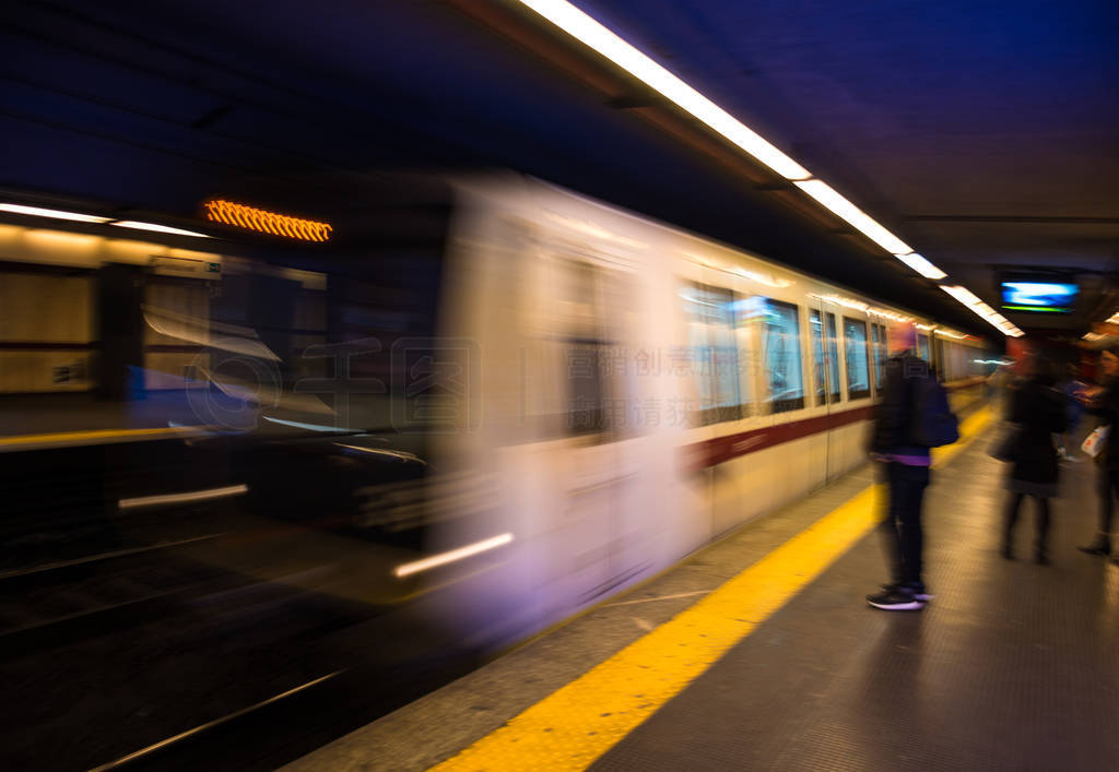 Abstract silhoettes of passengers in subway. Intentional motion