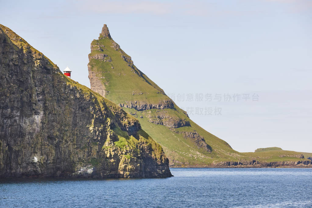 Faroe islands coastline cliffs landscape in Vagar island.