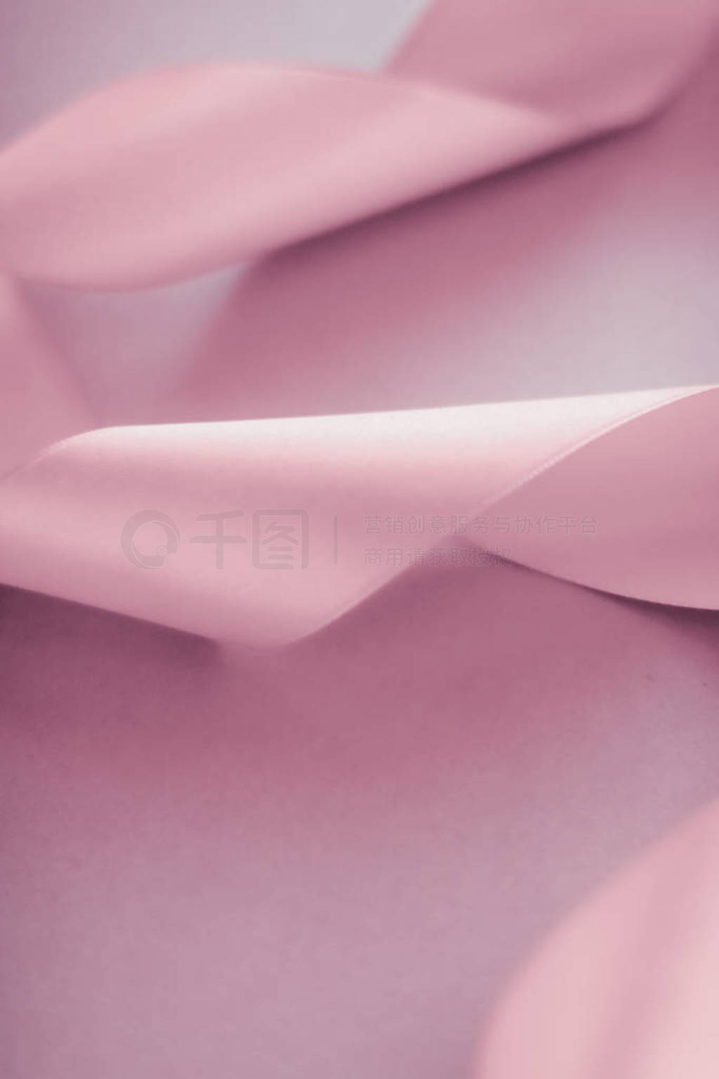 Abstract silk ribbon on blush pink background, exclusive luxury