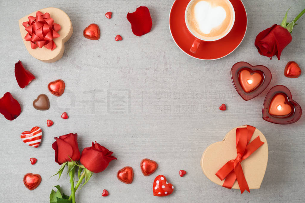 s day background with coffee cup, heart shape chocolates, candle