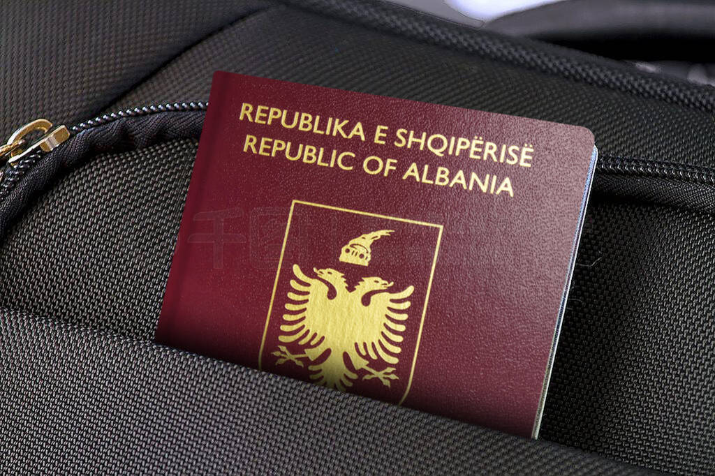 Close up of Albania Passport in Black Suitcase Pocket