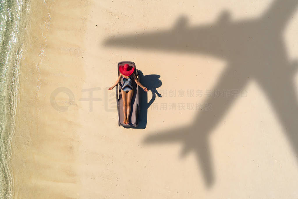 Concept of airplane travel to exotic destination with shadow of