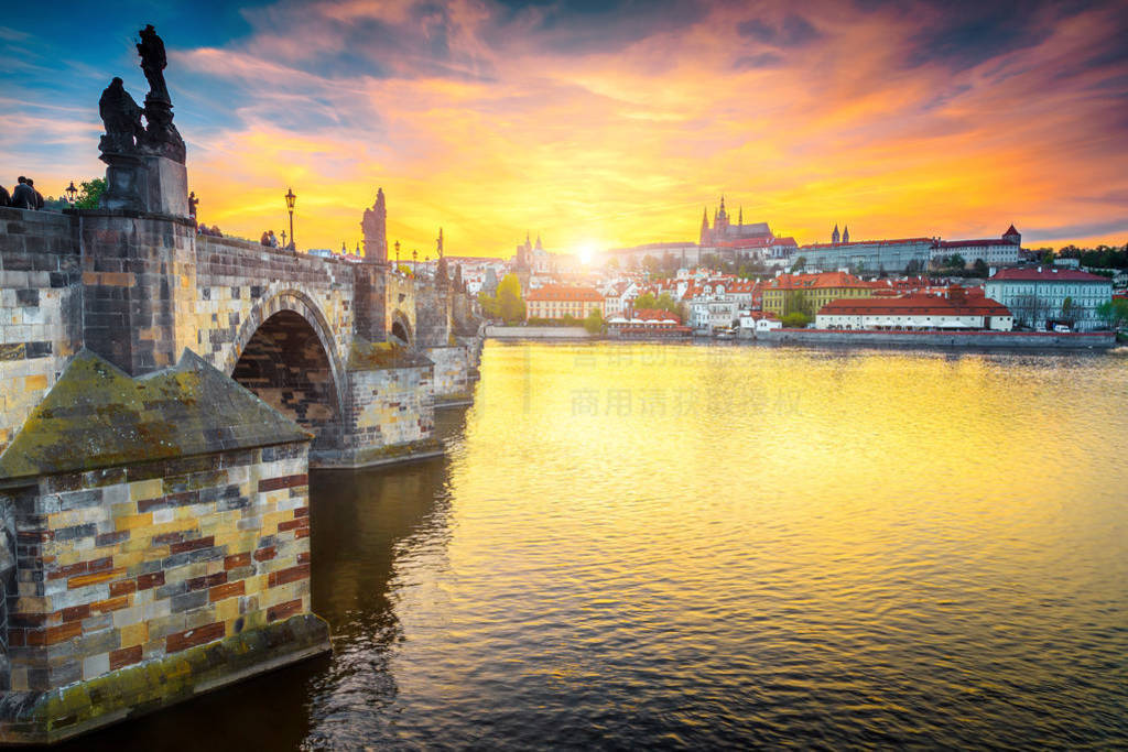 Medieval pedestrian stone Charles bridge at sunset, Prague, Czec