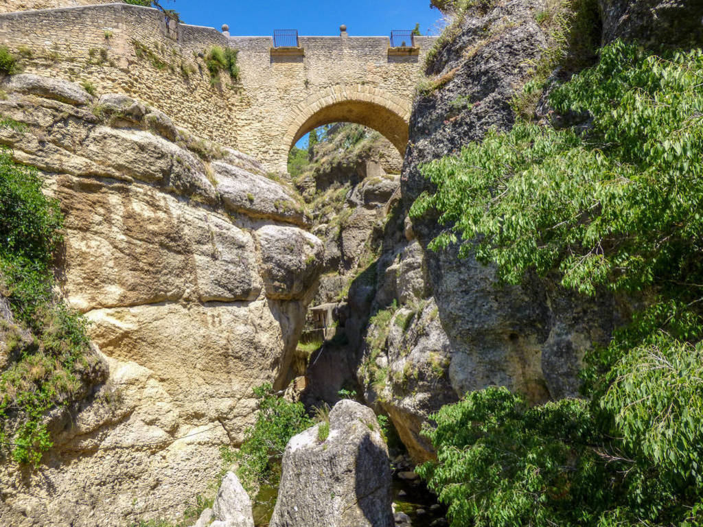 View of the valley, rock and Ponte Nuevo in Ronda, Spain