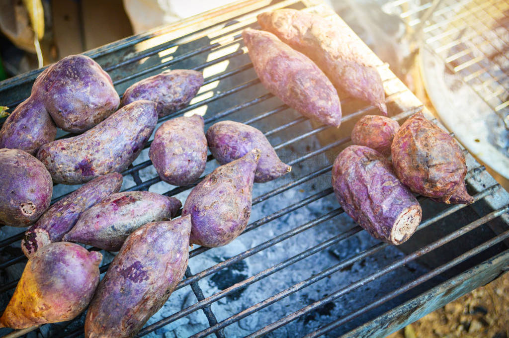 Grilled purple yam - sweet potato on grill