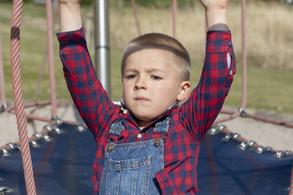 Fashion boy wearing checkered shirt