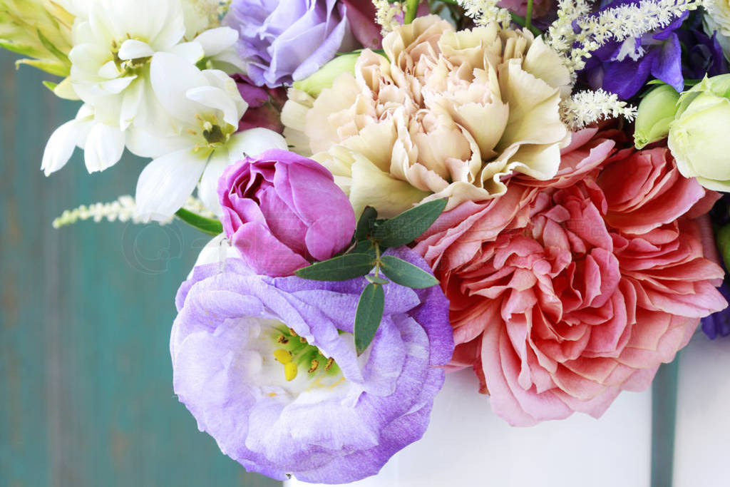 Flower background with rose, eustoma, carnation and spiraea.