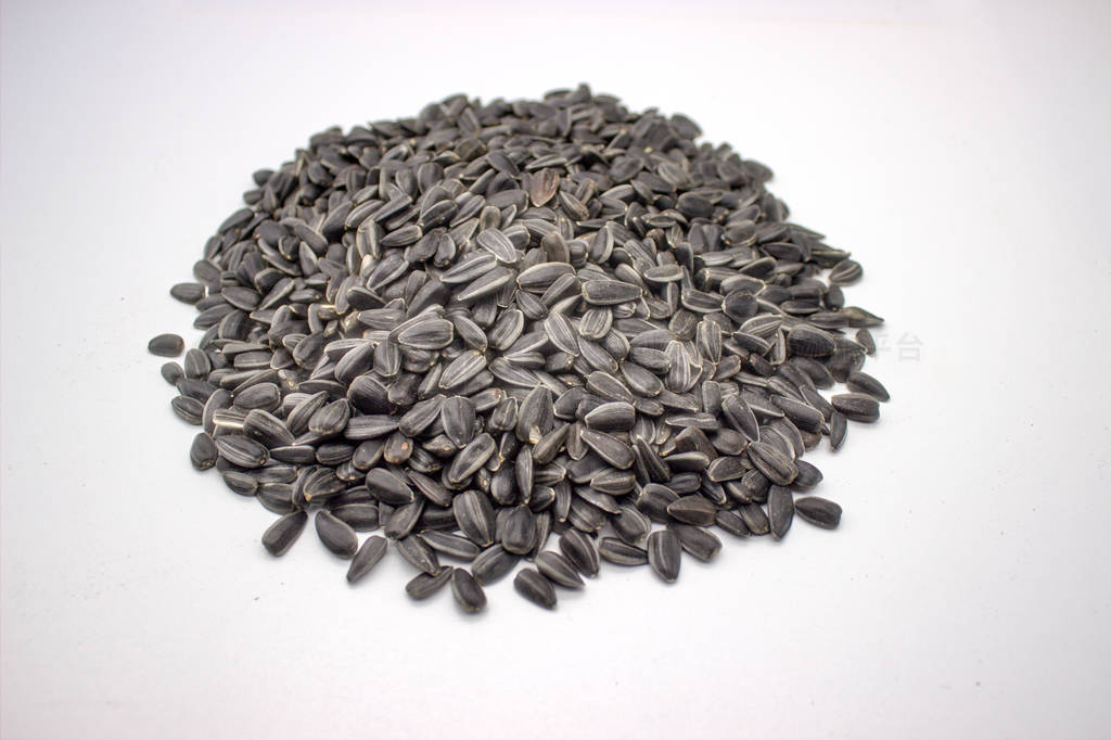 Ripe Sunflower Seeds On A White Background