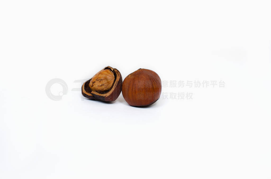 Closeup of hazelnuts, isolated on the white background, clipping