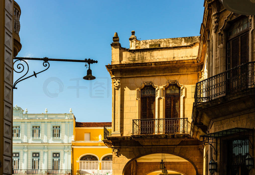 Facade of old colonial buildings from Central Square in Havana,