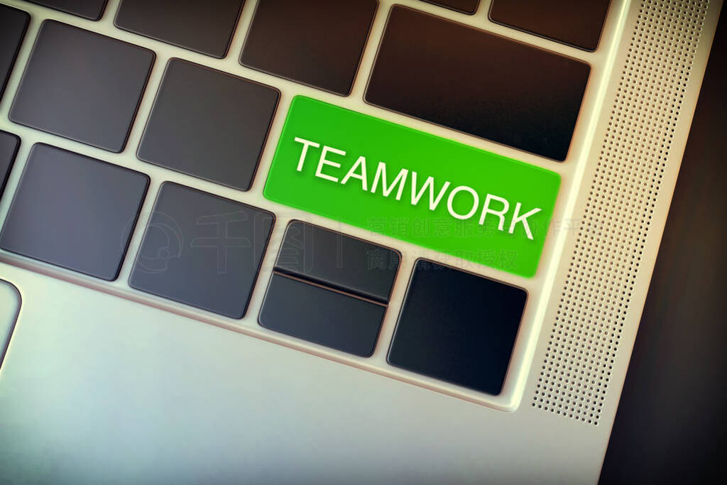 Teamwork concept. Word inprinted on the keyboard key with green