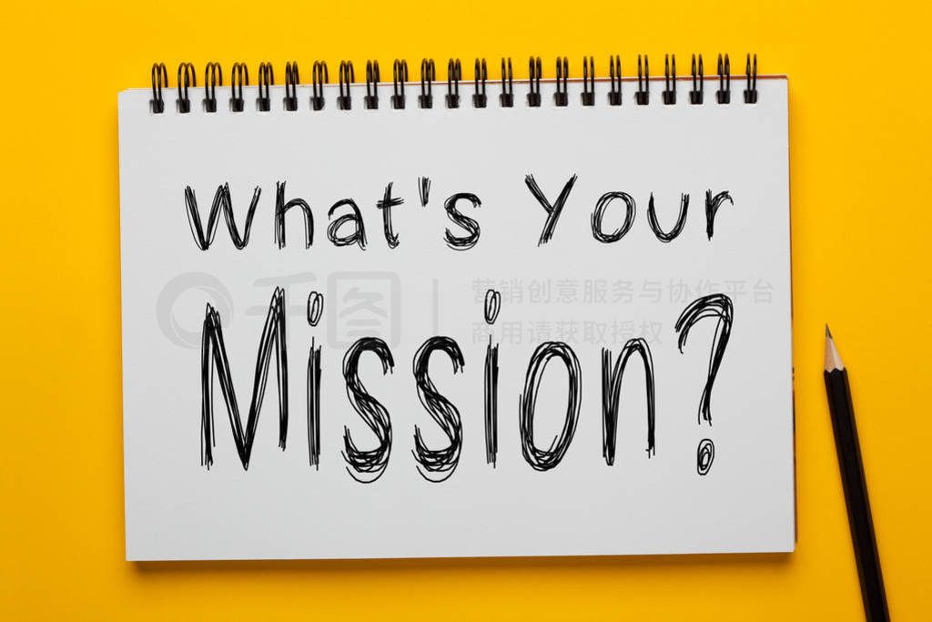 s Your Mission written on notepad with pencil on yellow backgrou