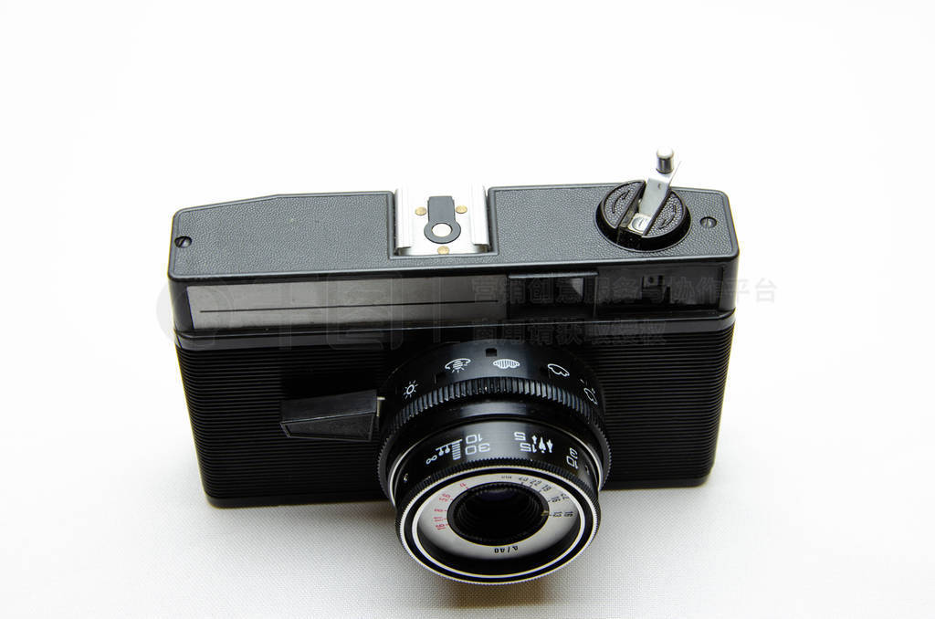 Old film camera. Rarity camera on a white background. A camera i