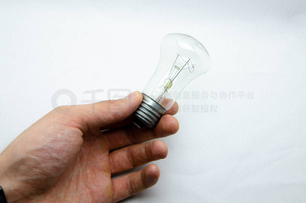 Ilyich bulb, incandescent lamp on a white and black background.