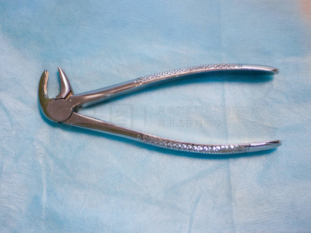 Dental tool for removing teeth. close top view. removal of a too