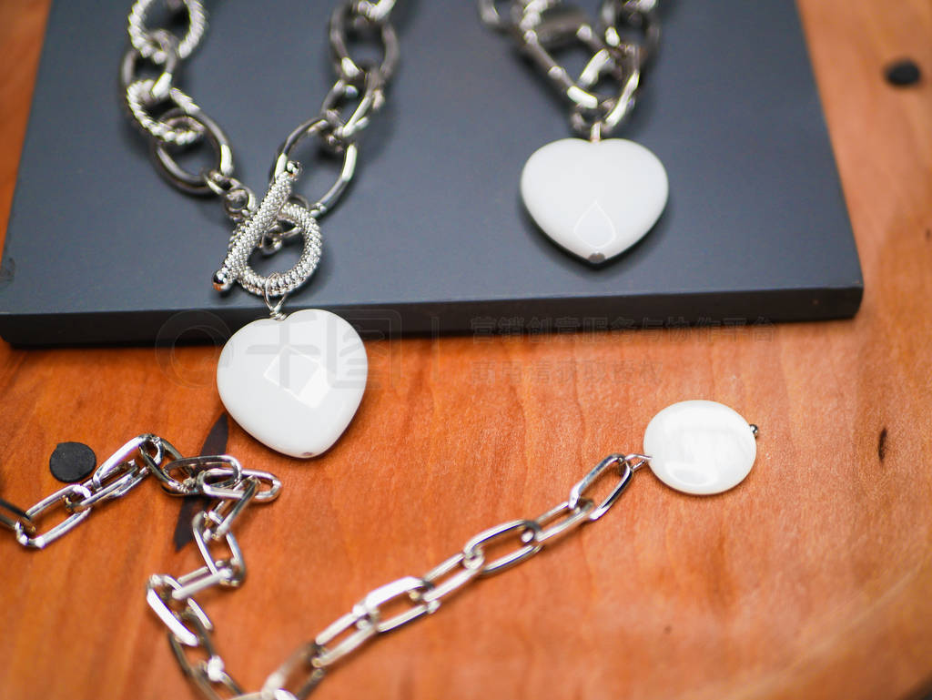 jewelry with a heart pendant. St. Valentines Day. A precious gif