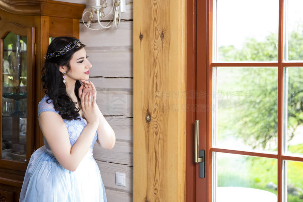 Sensual Relaxed Caucasian Brunette Female in Blue Wedding Dress