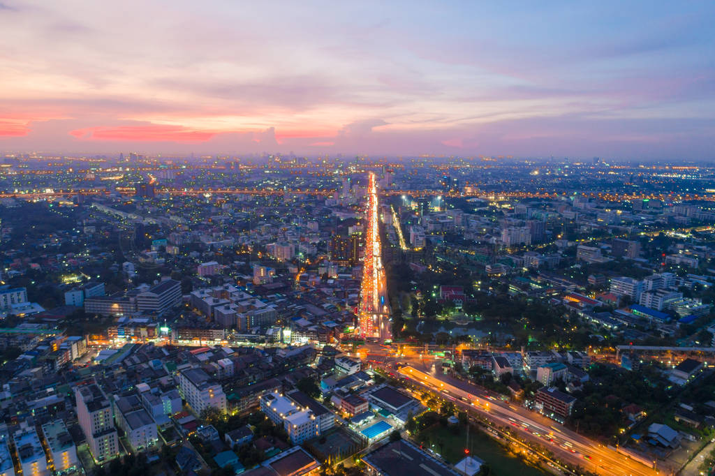 Aerial view sunset in Bangkok city building with city transport