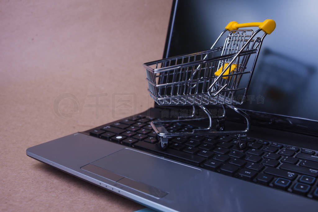 End of online sales. Online shopping, shopping cart on laptop ke