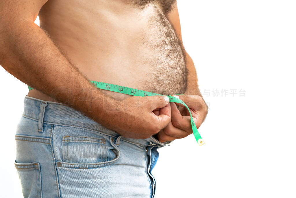 A man measures his fat belly with a measuring tape.