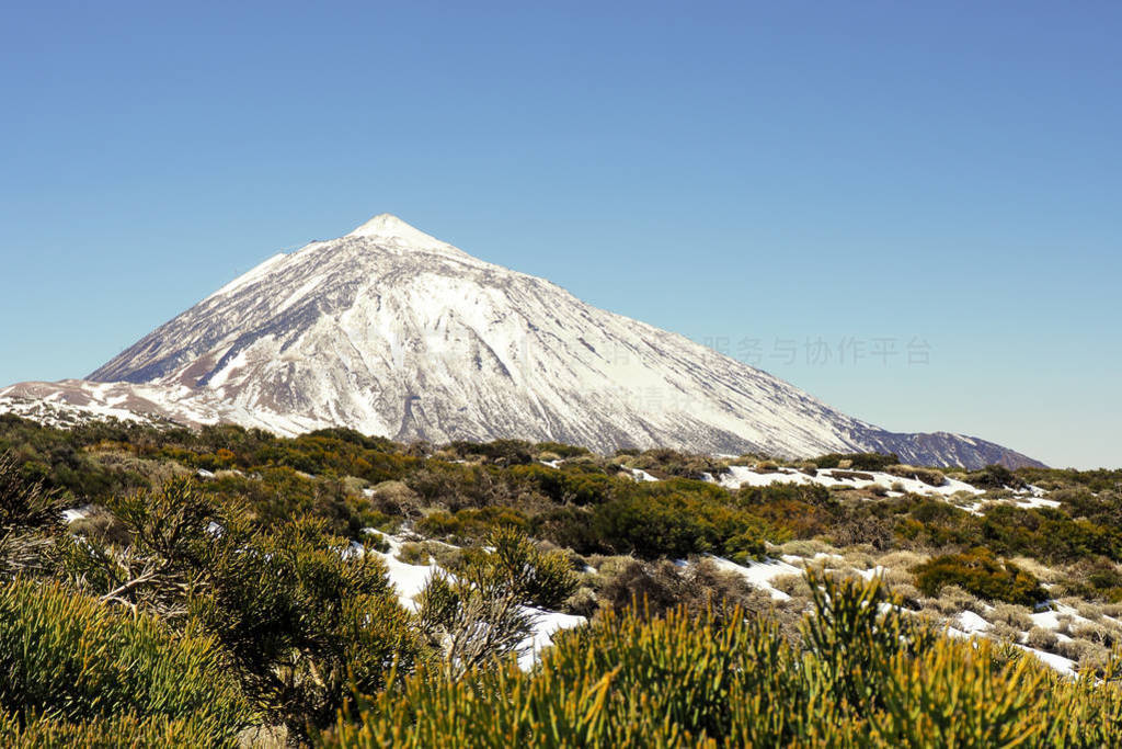 The highest mountain of Spain, the Pico El Teide on Tenerife wit