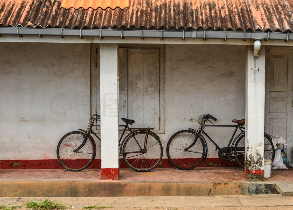 Old bicycle at rural house