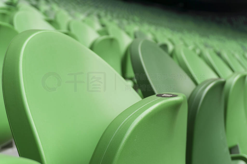 Empty plastic seats in a stadium. Matches to be played without f