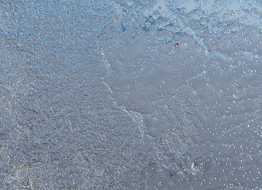 Sun rays caught in cracks in ice piece. Broken floe