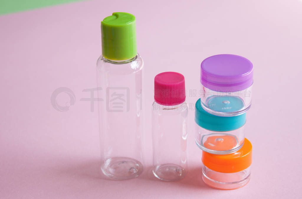 Travel size cosmetic and creams containers set.