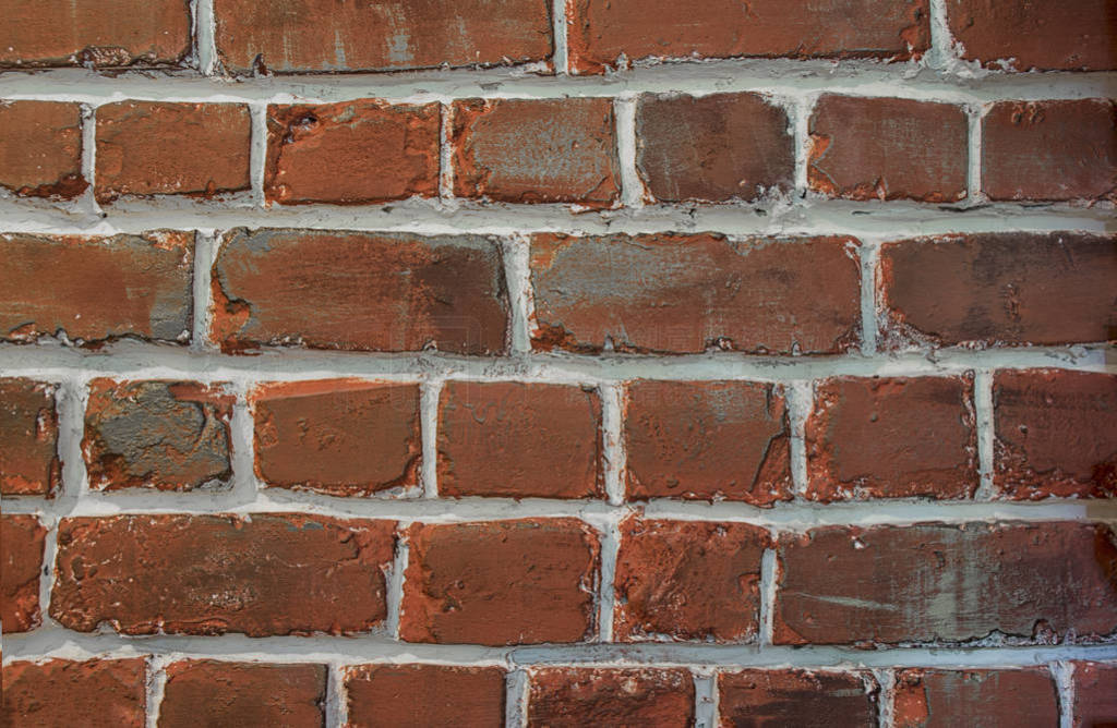 Close up view of a red brick wall