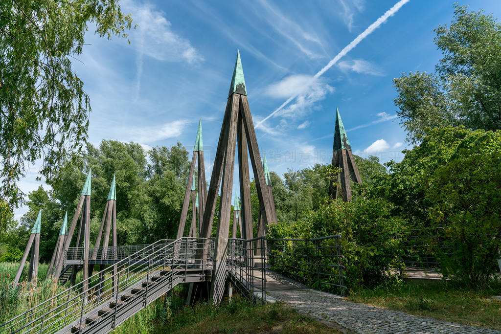 architectual striking wooden pedestrian bridge