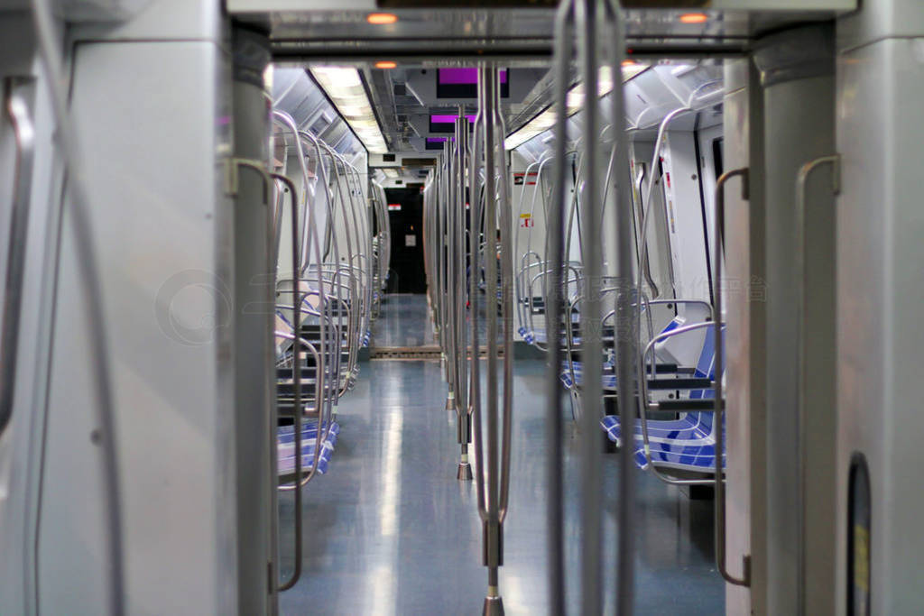 Interior of a modern and empty subway car.