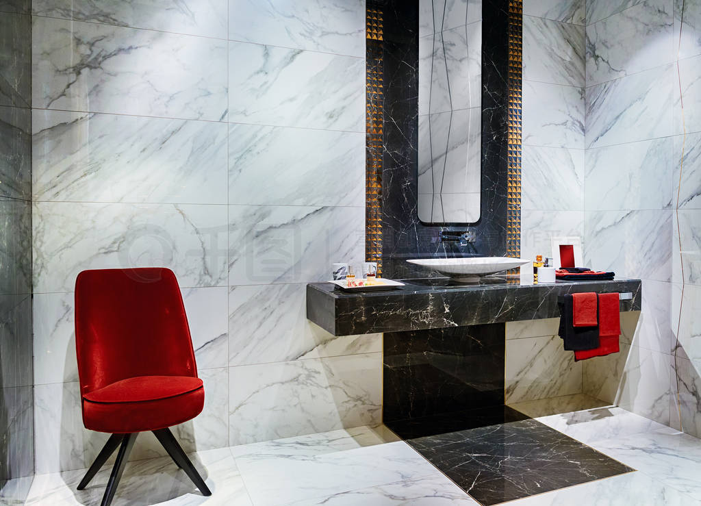 The modern interior of the washroom with black and white marble