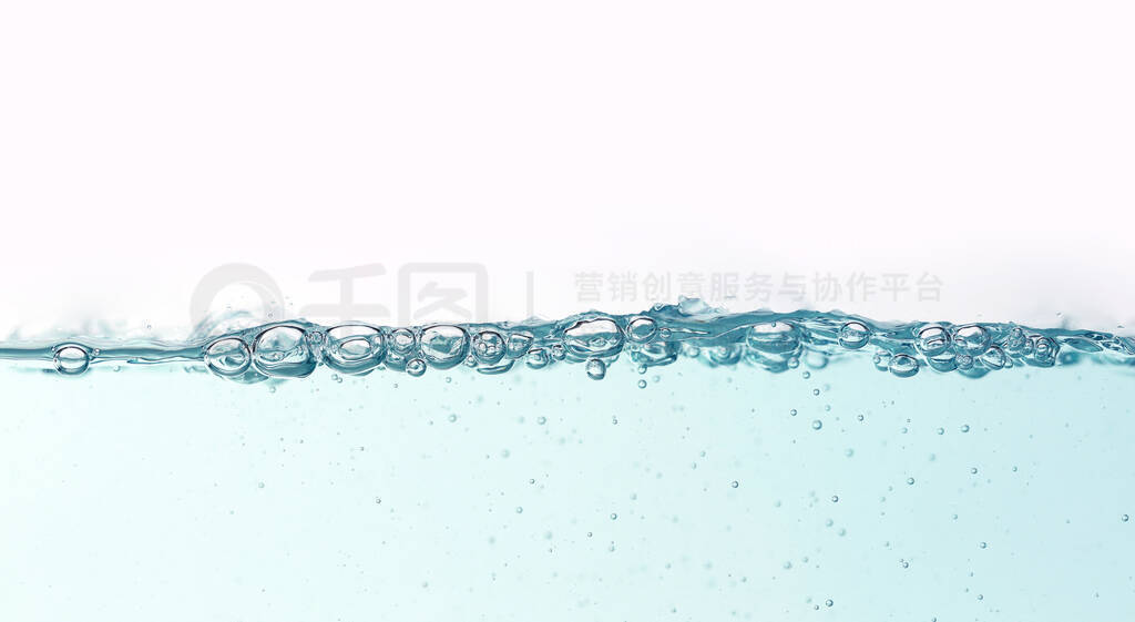 Close up blue water splash with air bubbles on white background