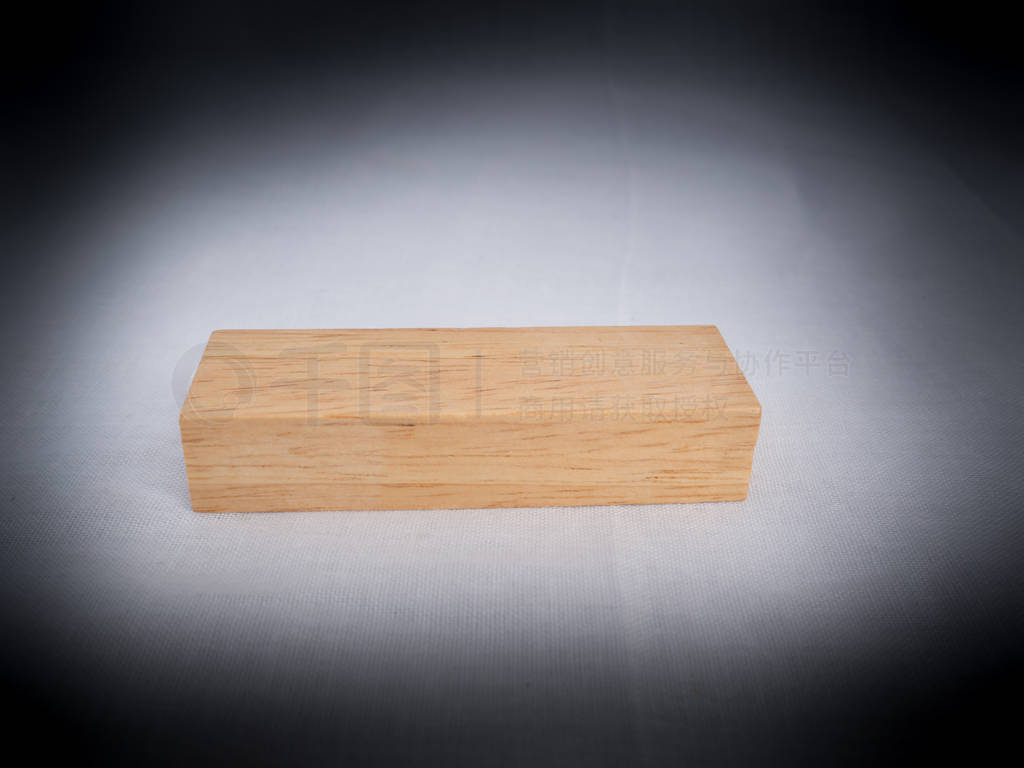 one wooden block isolated on white background