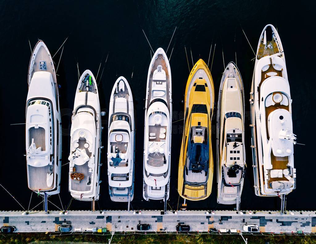 Aerial view from above at the luxury yachts in the marina