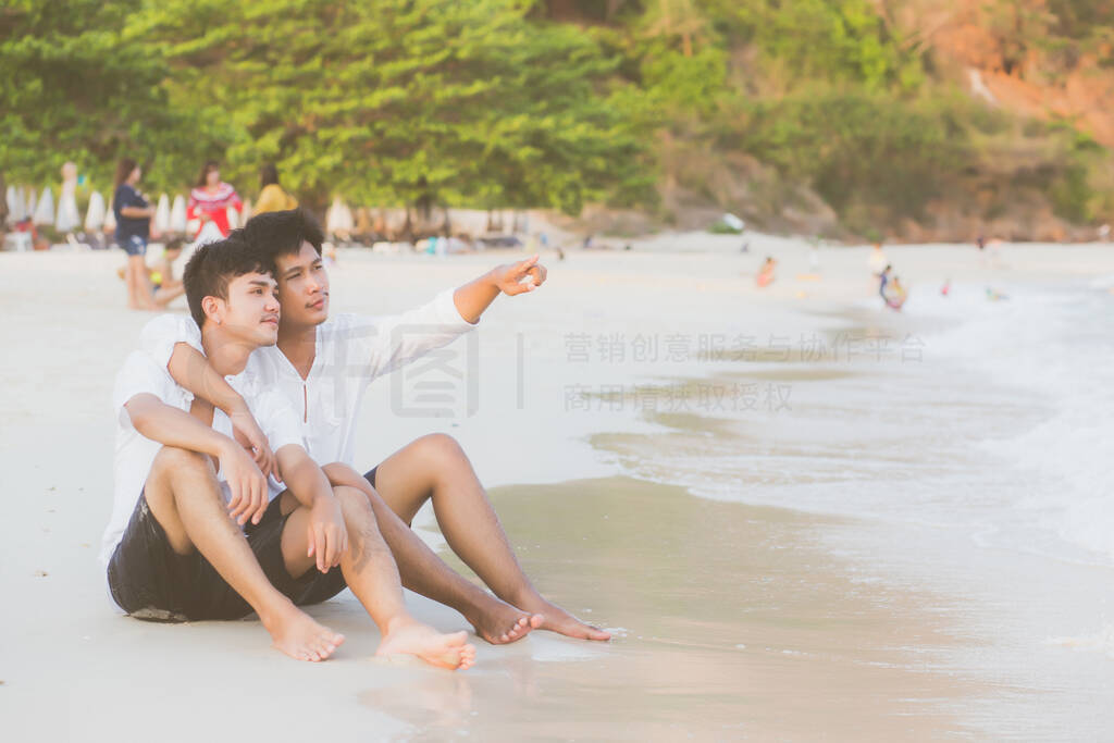 Homosexual portrait young asian couple sitting hug and pointing