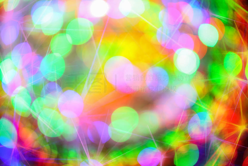 Background with defocused lights. Laser show. Disco party.