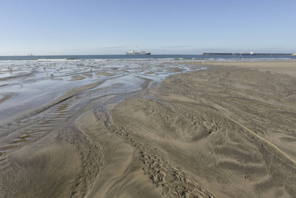 Empty beach during low tide