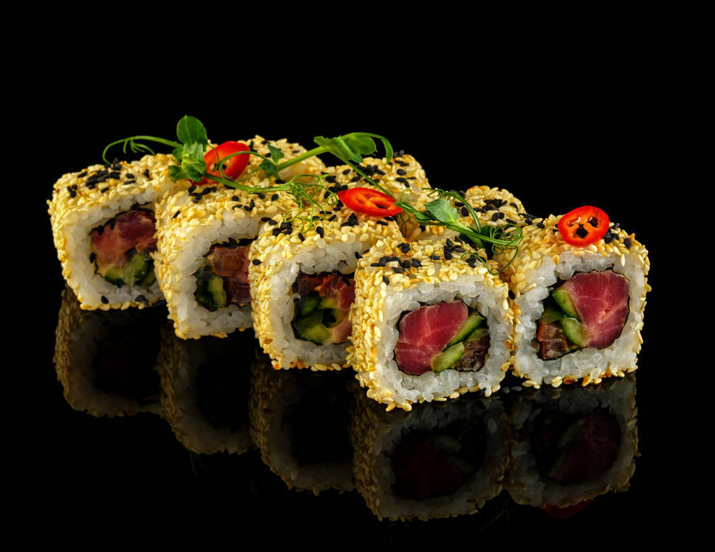 Set sushi roll. Traditional Japanese cuisine. Isolated on black