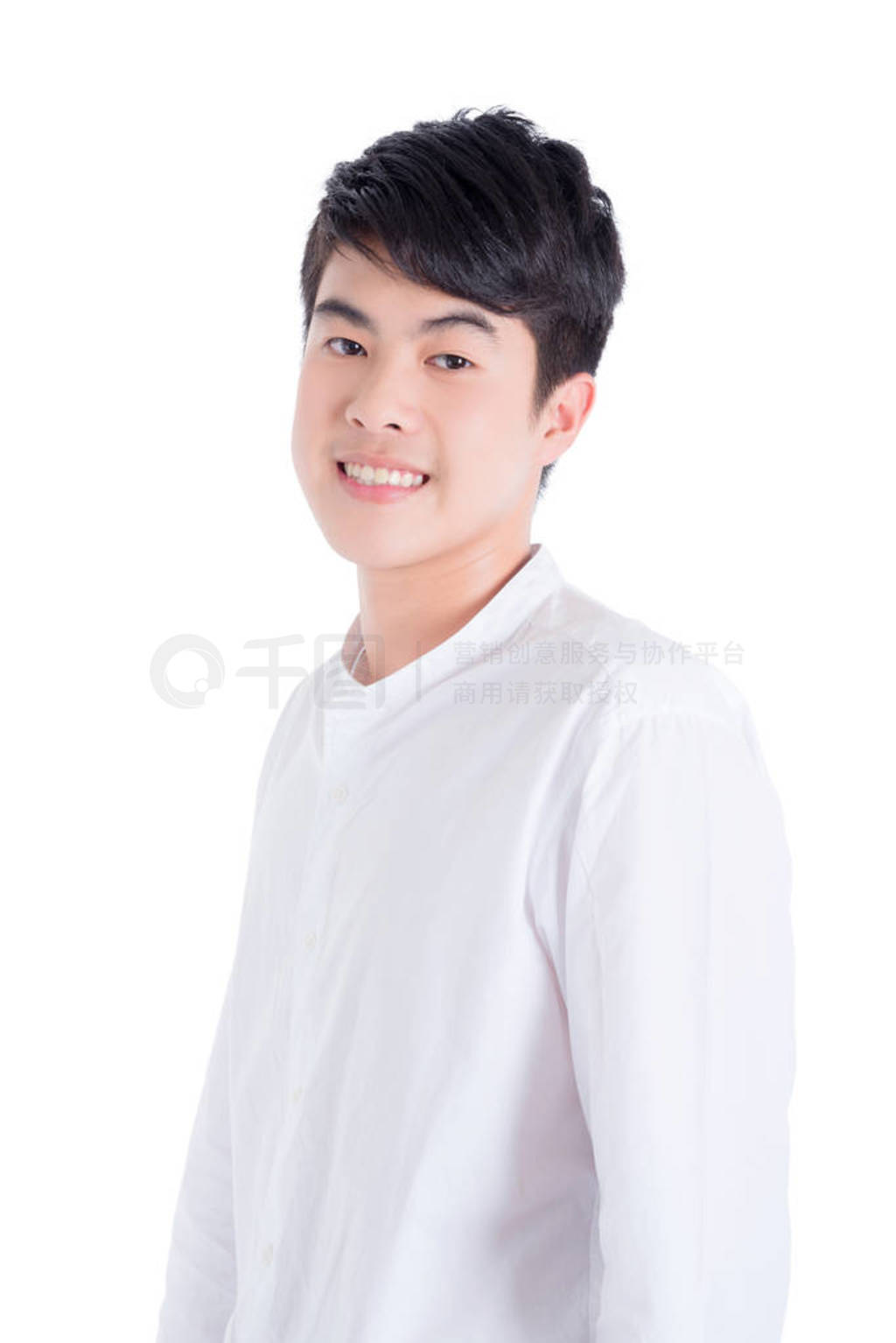 Young handsome man wearing white shirt standing and smiles