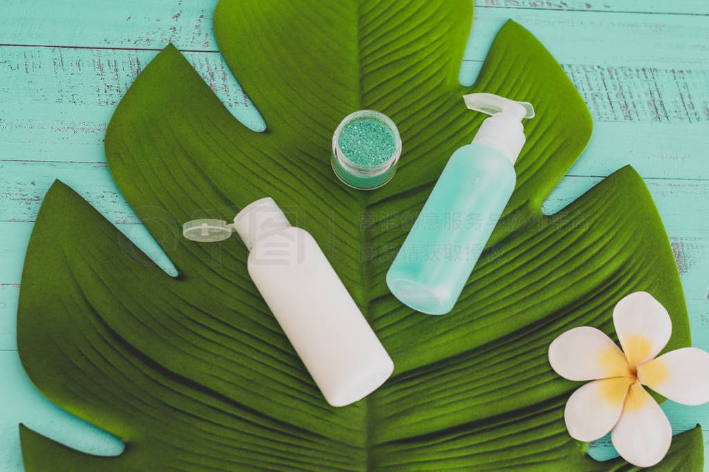 organic lotions and skincare products with tropical flowers and