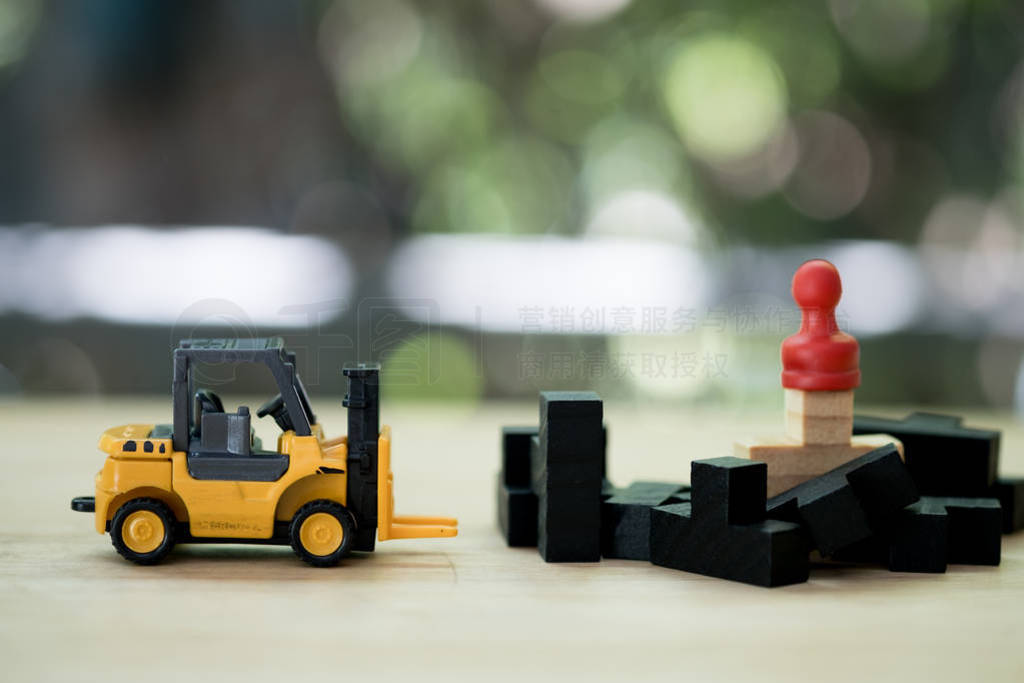 Forklift truck find for red chess pawn with black wood puzzle